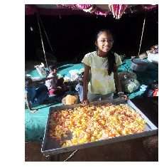 Volunteer serving fresh food to pilgrims